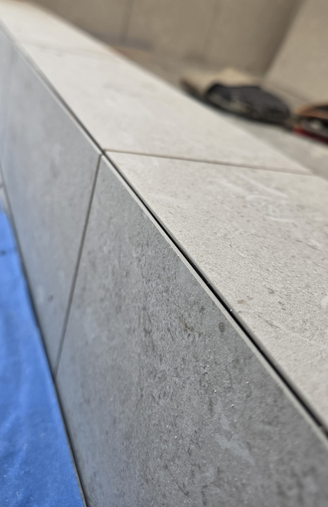 Close-up of precisely aligned bathroom tile edges